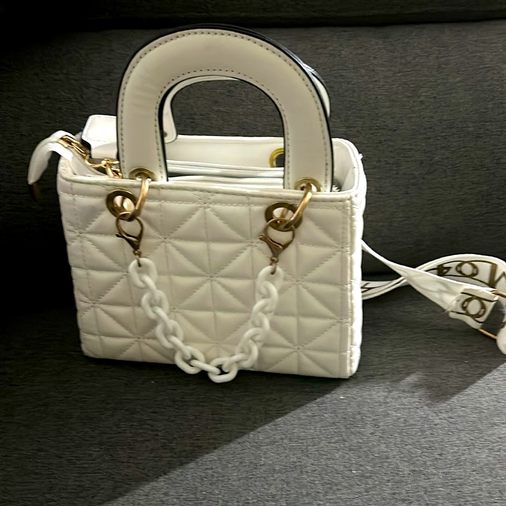 White mini hand bag great for jazzing up an outfit